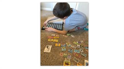 jay-bigalke-oldest-son-collecting-stamps