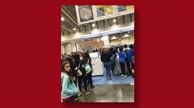 students-waiting-postal-service-booth